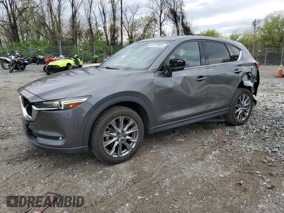 2019 Mazda CX-5 Signature with VIN JM3KFBEY3K0521581, listed as a Copart auction lot 53112925 with 62,977 mi miles and Salvage Title. Bid and sale history available at carsss.com. Image 1.