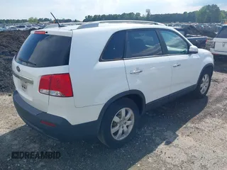 2013 Kia Sorento LX with VIN 5XYKT3A69DG348383, listed as a IAAI auction lot 42195952 with 179,451 mi miles and . Bid and sale history available at carsss.com. Image 4.