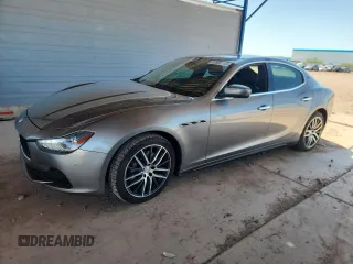 2017 Maserati Ghibli with VIN ZAM57XSA4H1251024, listed as a Copart auction lot 60865715 with 66,802 mi miles and Salvage title. Bid and sale history available at DreamBid. Image 1.