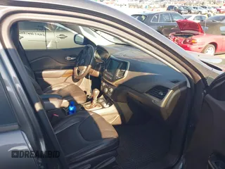 2014 Jeep Cherokee Trailhawk with VIN 1C4PJMBS6EW167517, listed as a IAAI auction lot 41947552 with 233,572 mi miles. Bid and sale history available at carsss.com. Image 5.