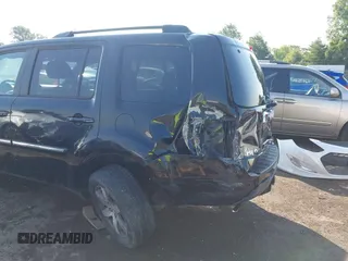 2013 Honda Pilot Touring z VIN 5FNYF4H96DB084148, wystawiony jako IAAI lot #42465066 z przebiegiem 220 339 mil mil oraz . Historia ofert i sprzedaży dostępna na DreamBid. Obrazek 6.