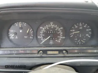 1985 Mercedes-Benz 190 z VIN WDBDB22C8FF039826, wystawiony jako Copart lot #47875265 z przebiegiem 159 296 mil mil oraz Szkody całkowita. Historia ofert i sprzedaży dostępna na DreamBid. Obrazek 9.
