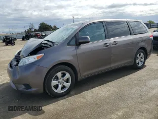 2012 Toyota Sienna z VIN 5TDKA3DC5CS014795, wystawiony jako Copart lot #52093245 z przebiegiem 291 043 mil mil oraz Szkoda całkowita • Salvage title. Historia ofert i sprzedaży dostępna na DreamBid. Obrazek 1.