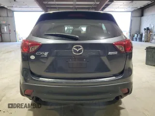2014 Mazda CX-5 Grand Touring with VIN JM3KE4DY3E0337732, listed as a Copart auction lot 50102235 with 143,109 mi miles and Salvage Title. Bid and sale history available at carsss.com. Image 6.