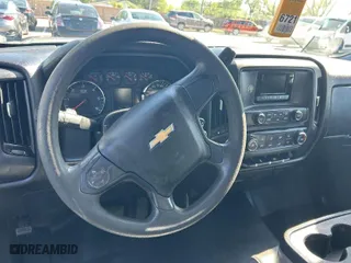 2015 Chevrolet Silverado 1500 Work Truck with VIN 1GCNCPEH4FZ321581, listed as a IAAI auction lot 42048001 with 208,075 mi miles. Bid and sale history available at carsss.com. Image 1.