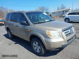 2006 Honda Pilot LX with VIN 2HKYF18106H545261, listed as a IAAI auction lot 41769869 with 214,889 mi miles. Bid and sale history available at carsss.com. Image 1.