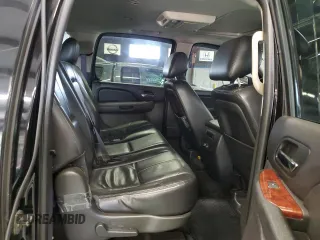 2014 Chevrolet Suburban LT with VIN 1GNSKJE77ER131290, listed as a Copart auction lot 71351994 with 258,058 mi miles and Clean Title. Bid and sale history available at carsss.com. Image 11.