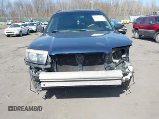 2006 Subaru Forester 2.5 X with VIN JF1SG63676H701450, listed as a IAAI auction lot 41805254 with 97,340 mi miles. Bid and sale history available at carsss.com. Image 6.