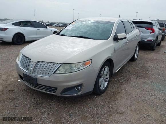 2009 Lincoln MKS with VIN 1LNHM93R79G626392, listed as a IAAI auction lot 41713232 with 130,136 mi miles. Bid and sale history available at carsss.com. Image 2.