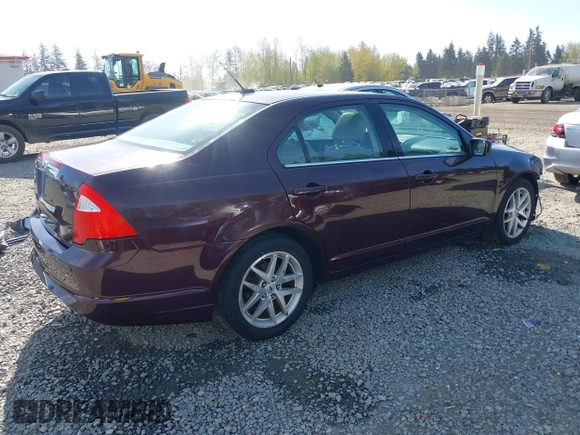 2011 Ford Fusion SEL with VIN 3FAHP0JA7BR220265, listed as a IAAI auction lot 42019909 with 170,287 mi miles. Bid and sale history available at carsss.com. Image 4.