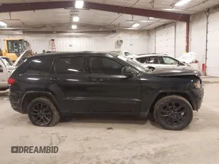 2018 Jeep Grand Cherokee Laredo E with VIN 1C4RJFAG5JC417701, listed as a IAAI auction lot 42001159 with 110,767 mi miles and . Bid and sale history available at DreamBid. Image 13.