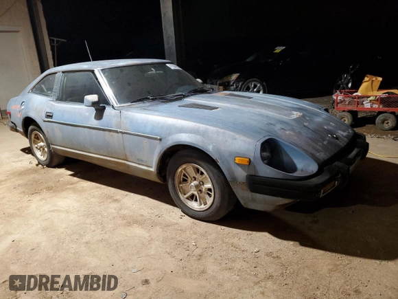 1979 Datsun 280ZX z VIN HGS130119790, wystawiony jako Copart lot #41504935 z przebiegiem 36 796 mil mil oraz Tytuł czysty. Historia ofert i sprzedaży dostępna na DreamBid. Obrazek 4.