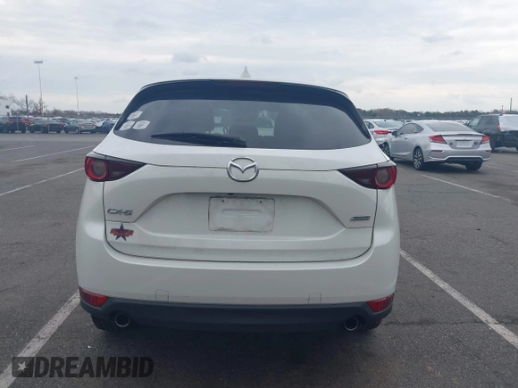 2017 Mazda CX-5 Touring with VIN JM3KFACL5H0189296, listed as a IAAI auction lot 42042328 with 60,208 mi miles and . Bid and sale history available at carsss.com. Image 16.