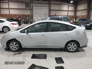 2007 Toyota Prius z VIN JTDKB20U977649489, wystawiony jako IAAI lot #41772600 z przebiegiem 248 525 mil mil oraz . Historia ofert i sprzedaży dostępna na DreamBid. Obrazek 14.