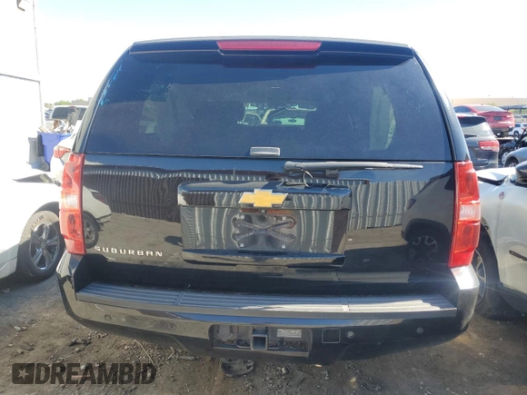 2014 Chevrolet Suburban LT with VIN 1GNSKJE71ER227075, listed as a Copart auction lot 76675654 with 214,113 mi miles and Salvage Title. Bid and sale history available at DreamBid. Image 6.