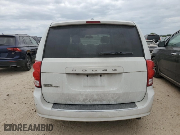 2015 Dodge Grand Caravan SE with VIN 2C4RDGBG3FR636473, listed as a Copart auction lot 53513275 with 128,994 mi miles and Salvage Title. Bid and sale history available at DreamBid. Image 6.