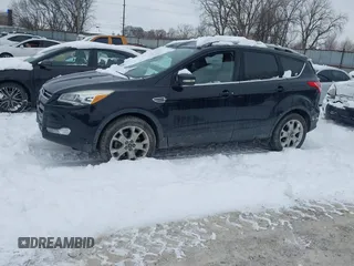 2016 Ford Escape Titanium with VIN 1FMCU9J96GUC08563, listed as a IAAI auction lot 41252475 with 120,404 mi miles. Bid and sale history available at carsss.com. Image 2.
