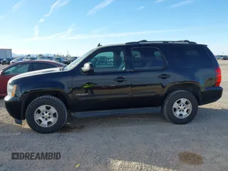 2013 Chevrolet Tahoe LS with VIN 1GNSCAE03DR193235, listed as a IAAI auction lot 41604766 with 204,455 mi miles and . Bid and sale history available at DreamBid. Image 14.