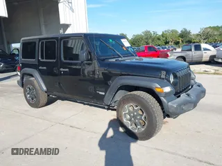 2021 Jeep Wrangler Unlimited Sport S with VIN 1C4HJXDN9MW770876, listed as a IAAI auction lot 40630311 with 62,235 mi miles. Bid and sale history available at carsss.com. Image 1.
