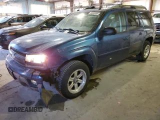2005 Chevrolet TrailBlazer LS with VIN 1GNET16SX56197069, listed as a Copart auction lot 88058495 with 233,373 mi miles and Salvage Title. Bid and sale history available at DreamBid. Image 1.