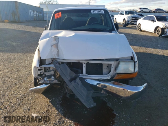 1999 Ford Ranger XLT with VIN 1FTYR10X8XUB20062, listed as a Copart auction lot 85779884 with 104,741 mi miles and Salvage title. Bid and sale history available at DreamBid. Image 5.