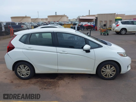 2016 Honda Fit LX z VIN JHMGK5H51GX038519, wystawiony jako IAAI lot #41809636 z przebiegiem 96 894 mil mil oraz . Historia ofert i sprzedaży dostępna na DreamBid. Obrazek 13.