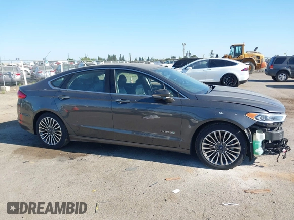 2017 Ford Fusion Hybrid SE с VIN 3FA6P0LU7HR110436, выставлен на аукционе IAAI как лот 42669395 с пробегом 104 472 миль миль и . История ставок и продаж доступна на DreamBid. Изображение 14.