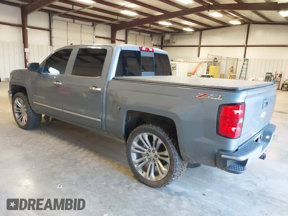 2015 Chevrolet Silverado 1500 LTZ with VIN 3GCUKSEC1FG473825, listed as a IAAI auction lot 41710553 with 212,959 mi miles and . Bid and sale history available at DreamBid. Image 3.