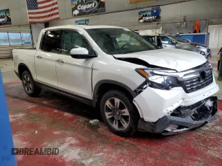 2017 Honda Ridgeline RTL-E with VIN 5FPYK3F72HB002890, listed as a Copart auction lot 57699735 with 128,813 mi miles and Salvage title. Bid and sale history available at DreamBid. Image 4.