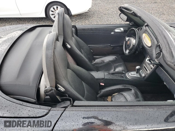 2005 Porsche Boxster z VIN WP0CA298X5U712515, wystawiony jako Copart lot #74030354 z przebiegiem Nie podano mil oraz Szkoda całkowita • Salvage title. Historia ofert i sprzedaży dostępna na DreamBid. Obrazek 10.