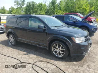 2013 Dodge Journey R/T z VIN 3C4PDDEG5DT597459, wystawiony jako Copart lot #62711755 z przebiegiem 152 498 mil mil oraz Czysty tytuł • Clean title. Historia ofert i sprzedaży dostępna na DreamBid. Obrazek 4.
