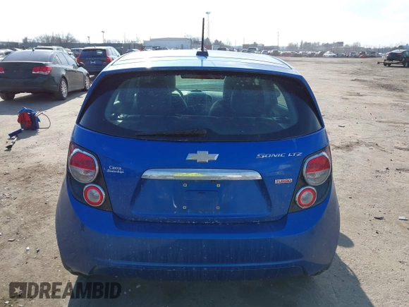 2016 Chevrolet Sonic LTZ z VIN 1G1JE6SB5G4150771, wystawiony jako IAAI lot #41662866 z przebiegiem 101 476 mil mil oraz . Historia ofert i sprzedaży dostępna na DreamBid. Obrazek 16.