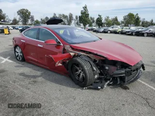 2020 Tesla Model S Long Range with VIN 5YJSA1E22LF401139, listed as a Copart auction lot 44770285 with 128,685 mi miles and Salvage title. Bid and sale history available at DreamBid. Image 4.
