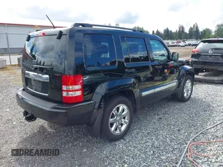 2012 Jeep Liberty Sport z VIN 1C4PJMAK7CW175981, wystawiony jako IAAI lot #42317545 z przebiegiem 75 211 mil mil oraz . Historia ofert i sprzedaży dostępna na DreamBid. Obrazek 4.