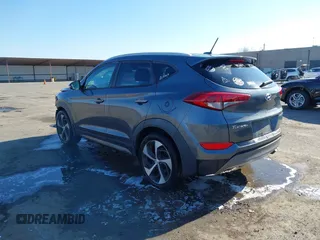 2016 Hyundai Tucson Limited with VIN KM8J33A22GU231834, listed as a IAAI auction lot 41312526 with 117,423 mi miles. Bid and sale history available at carsss.com. Image 3.