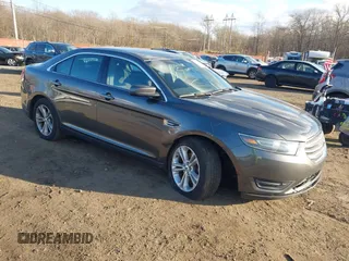 2015 Ford Taurus SEL with VIN 1FAHP2H86FG174102, listed as a IAAI auction lot 40997366 with 132,543 mi miles. Bid and sale history available at carsss.com. Image 1.