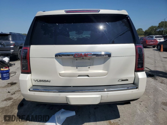 2015 GMC Yukon Denali with VIN 1GKS2CKJ3FR663324, listed as a Copart auction lot 70306614 with 154,234 mi miles and Salvage Title. Bid and sale history available at carsss.com. Image 6.