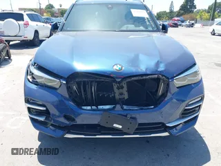 2020 BMW X5 sDrive40i with VIN 5UXCR4C03L9C82755, listed as a IAAI auction lot 42494503 with 50,706 mi miles and . Bid and sale history available at DreamBid. Image 6.