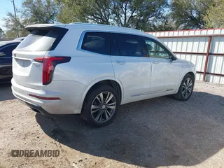 2021 Cadillac XT6 Premium Luxury z VIN 1GYKPCRS6MZ230499, wystawiony jako IAAI lot #41808404 z przebiegiem 86 933 mil mil oraz . Historia ofert i sprzedaży dostępna na DreamBid. Obrazek 4.