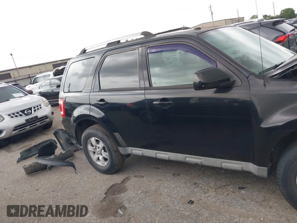 2009 Ford Escape Limited z VIN 1FMCU04779KB54792, wystawiony jako IAAI lot #42629083 z przebiegiem 148 350 mil mil oraz . Historia ofert i sprzedaży dostępna na DreamBid. Obrazek 14.