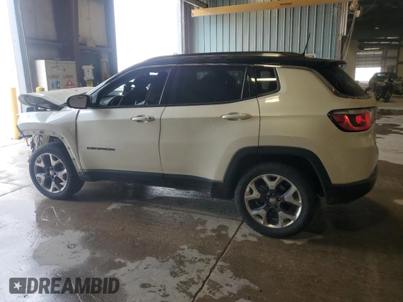 2018 Jeep Compass Limited with VIN 3C4NJDCB5JT373014, listed as a Copart auction lot 57285935 with 85,195 mi miles and Salvage title. Bid and sale history available at DreamBid. Image 2.