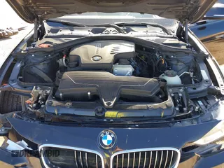 2012 BMW 3 Series 328i with VIN WBA3A5C58CF256254, listed as a IAAI auction lot 41676209 with 68,893 mi miles. Bid and sale history available at carsss.com. Image 10.