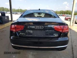 2013 Audi A8 4.0L z VIN WAUR2AFD5DN009591, wystawiony jako Copart lot #63635535 z przebiegiem 159 321 mil mil oraz Czysty tytuł • Clean title. Historia ofert i sprzedaży dostępna na DreamBid. Obrazek 6.