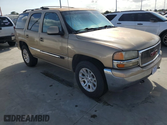 2000 GMC Yukon SLT with VIN 1GKEC13T0YJ204011, listed as a Copart auction lot 74451944 with 0 mi miles and Salvage Title. Bid and sale history available at carsss.com. Image 4.
