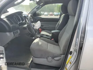 2012 Toyota Tacoma with VIN 5TFLU4ENXCX027960, listed as a Copart auction lot 60689025 with 209,480 mi miles and Salvage title. Bid and sale history available at DreamBid. Image 7.