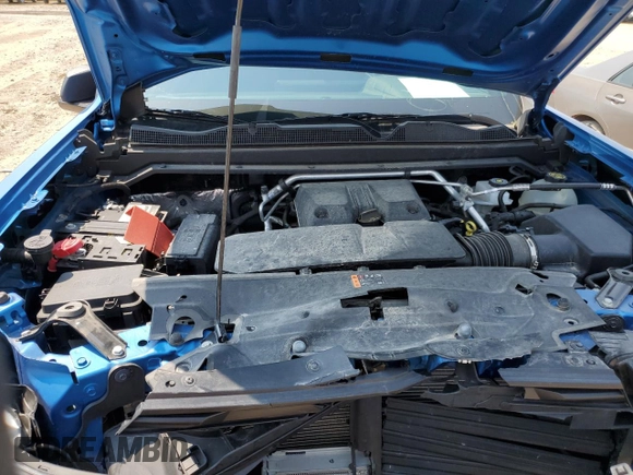 2023 Chevrolet Colorado 4WD Trail Boss z VIN 1GCPTEEK1P1126305, wystawiony jako Copart lot #53565985 z przebiegiem 12 254 mil mil oraz Szkoda całkowita • Salvage title. Historia ofert i sprzedaży dostępna na DreamBid. Obrazek 13.