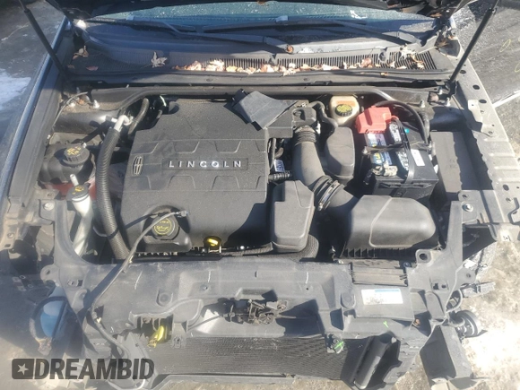 2016 Lincoln MKS z VIN 1LNHL9DK0GG600153, wystawiony jako Copart lot #41561325 z przebiegiem 71 909 mil mil oraz Szkoda całkowita • Salvage title. Historia ofert i sprzedaży dostępna na DreamBid. Obrazek 11.