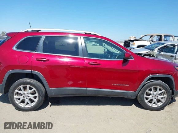 2016 Jeep Cherokee Latitude with VIN 1C4PJLCSXGW178113, listed as a IAAI auction lot 42643544 with 122,347 mi miles and . Bid and sale history available at DreamBid. Image 13.