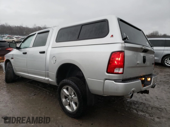 2015 Ram 1500 Tradesman with VIN 3C6RR7KT4FG700631, listed as a Copart auction lot 83668364 with 166,785 mi miles and Salvage title. Bid and sale history available at DreamBid. Image 2.