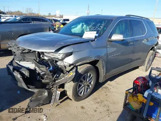 2023 Chevrolet Traverse LT Cloth with VIN 1GNERGKW6PJ116692, listed as a IAAI auction lot 41729534 with 62,085 mi miles. Bid and sale history available at carsss.com. Image 2.